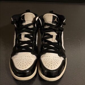Jordan Kids Black and White High-Top Sneakers